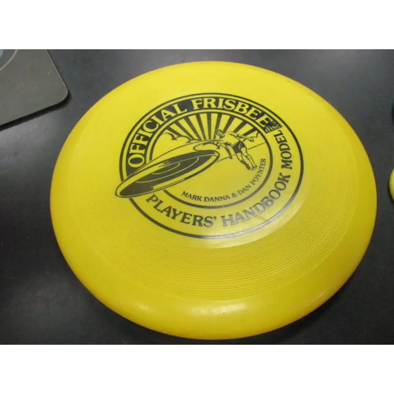 Used Official Firsbee Disc with Player's Handbook