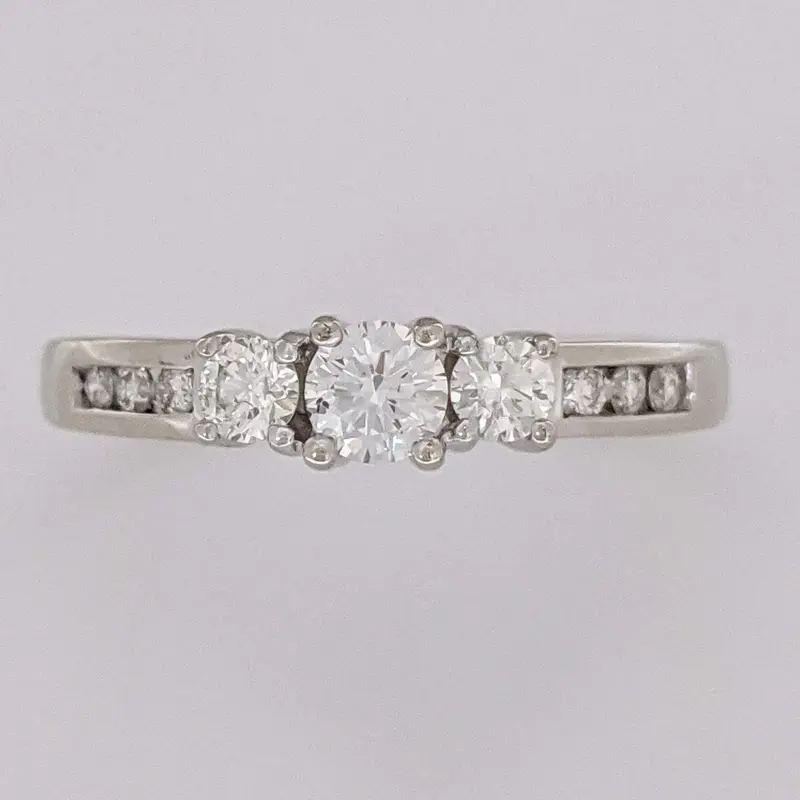 14K WHITE .48 CARAT TOTAL WEIGHT I1 J DIAMOND ROUND (9) ESTATE TRINITY RING 3.2 GRAMS